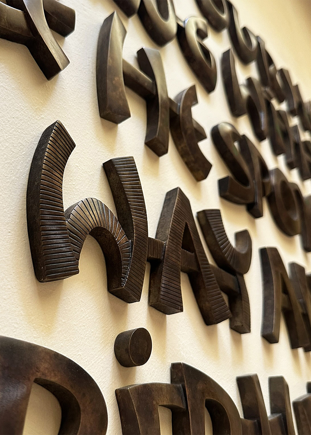 Robbie Schneider - Bronze letter art - Sculpted art - Seattle